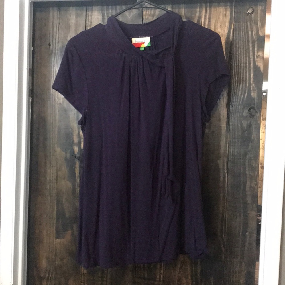 Purple tie at neck shirt